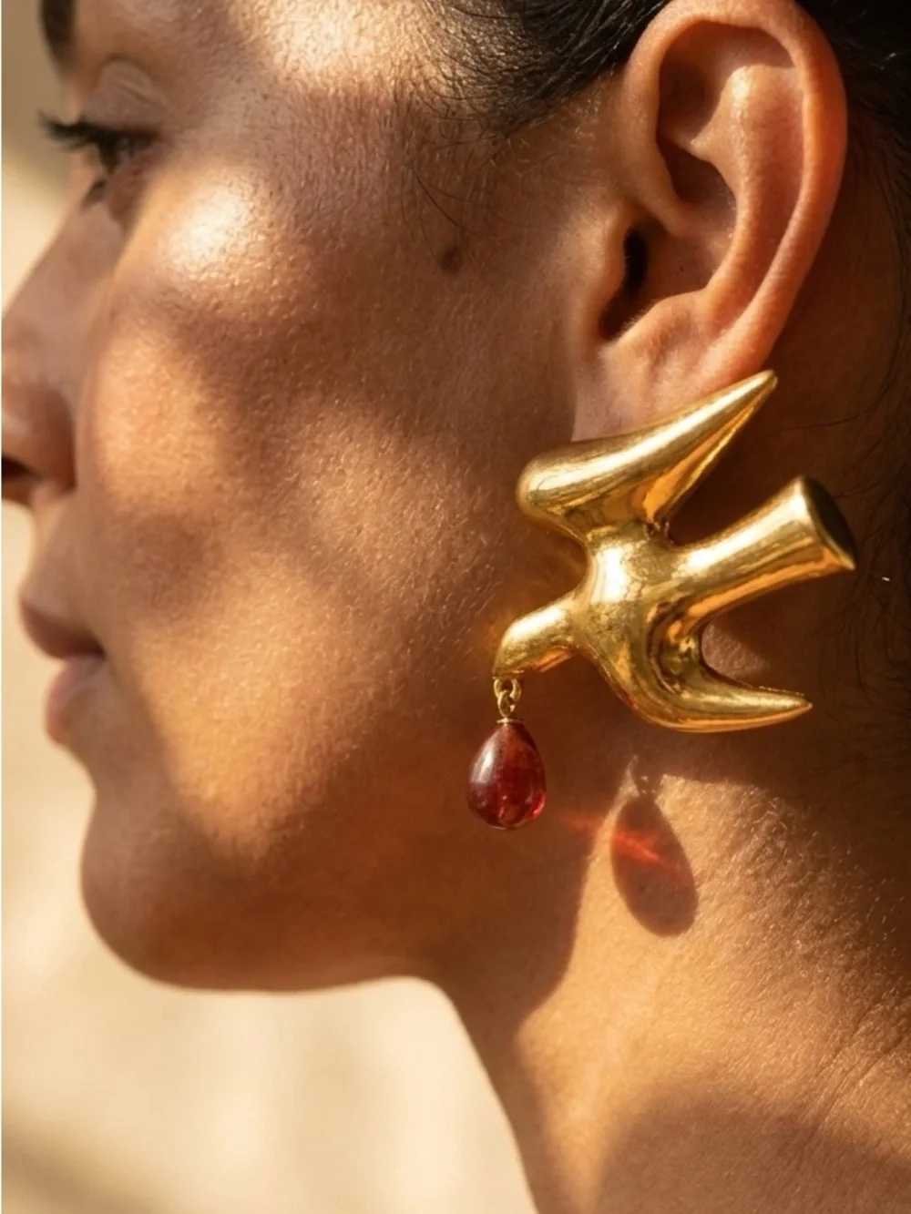 Gold-Tone Flying Bird Statement Earrings with Read Teardrop Accent